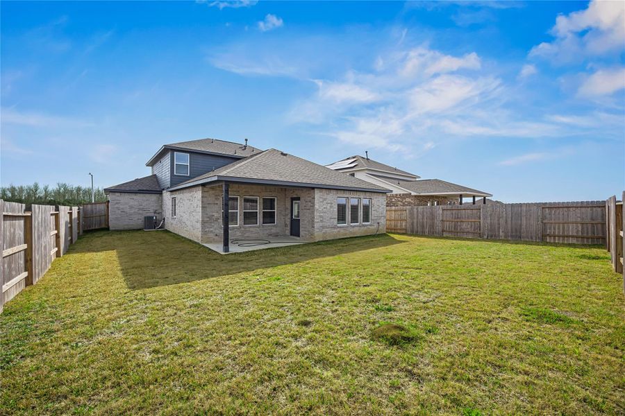 Exterior details and patio area of a home in River Ranch Meadows, Dayton (Image 4).