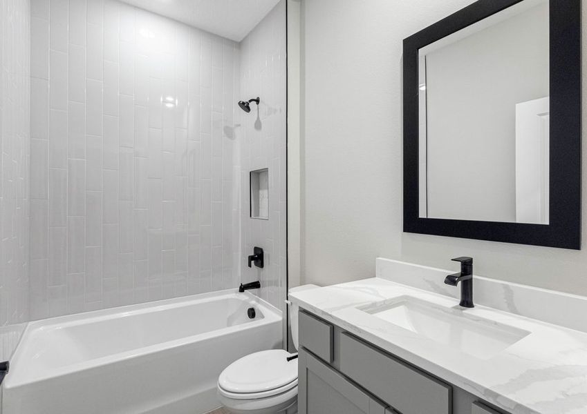 Guests can get ready for their day in the spacious secondary bathroom