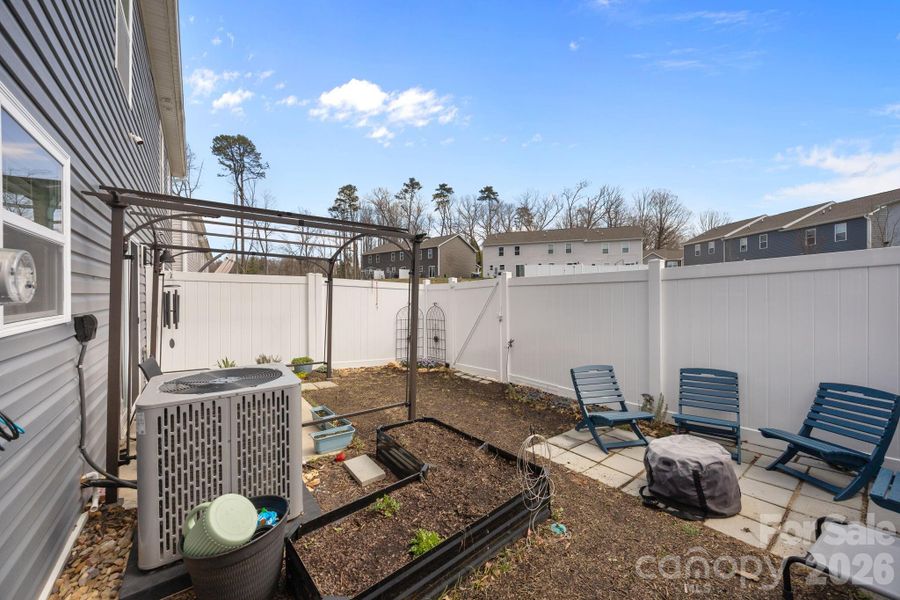 Exterior details and patio area of a home in , Candler (Image 22). Exterior details and patio area of a home in , Candler (Image 22).