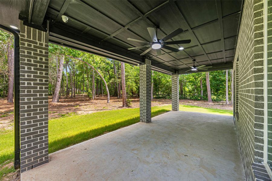 Exterior details and patio area of a home in , Splendora (Image 29).