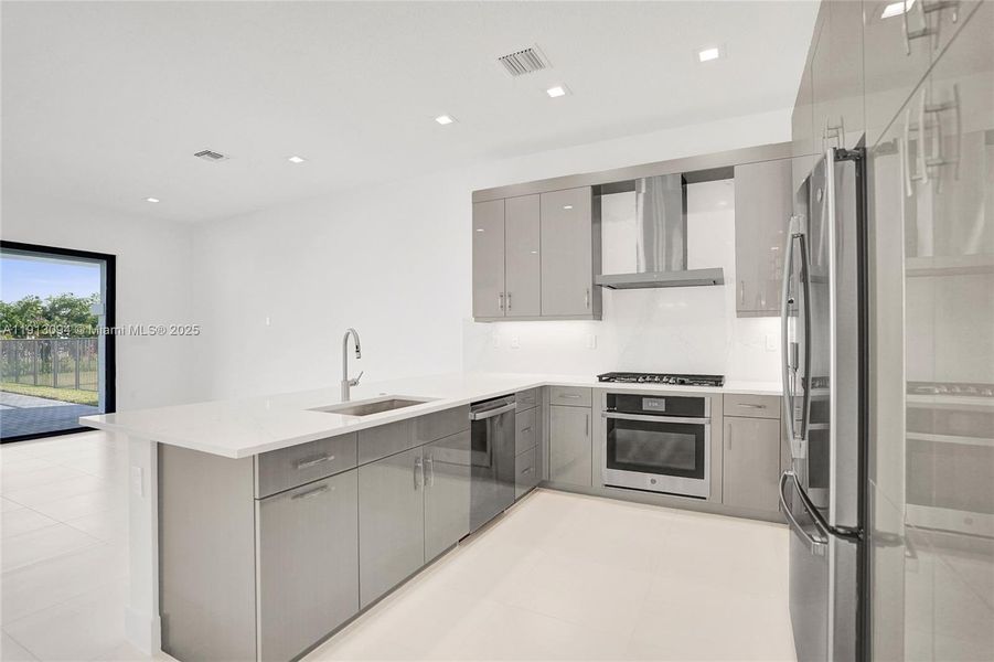 Furnished interior view inside a new home in Apex at Avenir, Palm Beach Gardens (Image 18).
