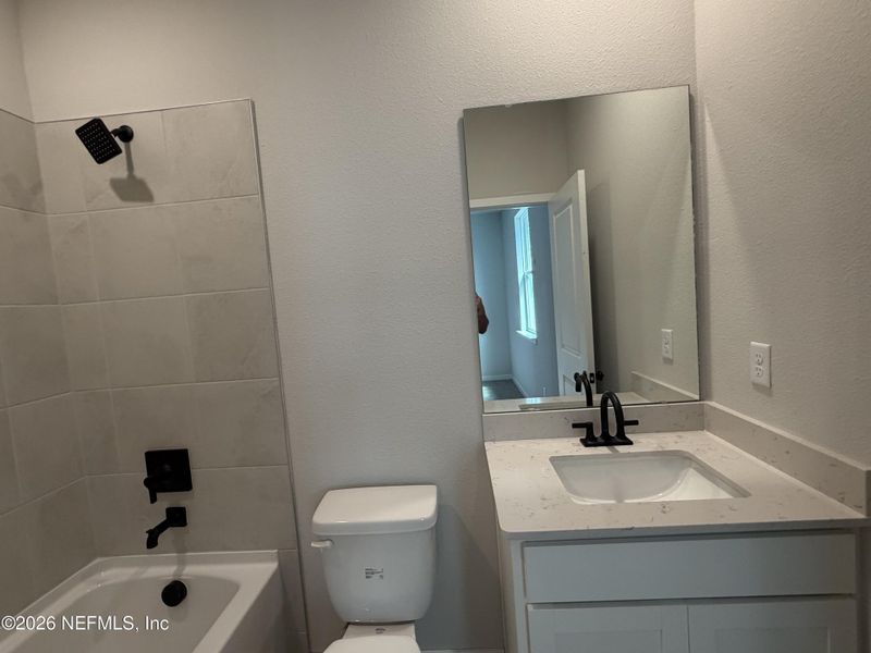 Furnished interior view inside a new home in Reserve East, Flagler Beach (Image 16).