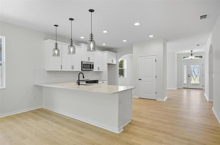 Furnished interior view inside a new home in Matanzas Cove, Palm Coast (Image 3).
