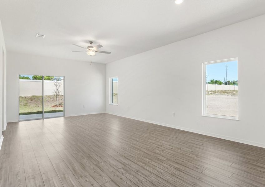 A sliding door in the family rooms leads to the patio A sliding door in the family rooms leads to the patio