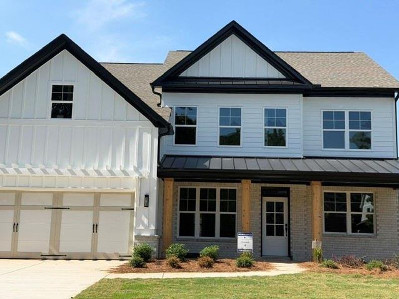 Front exterior of a new home in , Marietta, GA, highlighting curb appeal (Image 2). Front exterior of a new home in , Marietta, GA, highlighting curb appeal (Image 2).