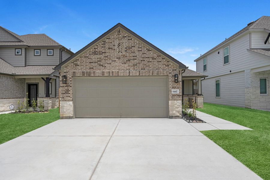Front exterior of a new home in Cypresswood Landing, Humble, TX, highlighting curb appeal (Image 2). Front exterior of a new home in Cypresswood Landing, Humble, TX, highlighting curb appeal (Image 2).