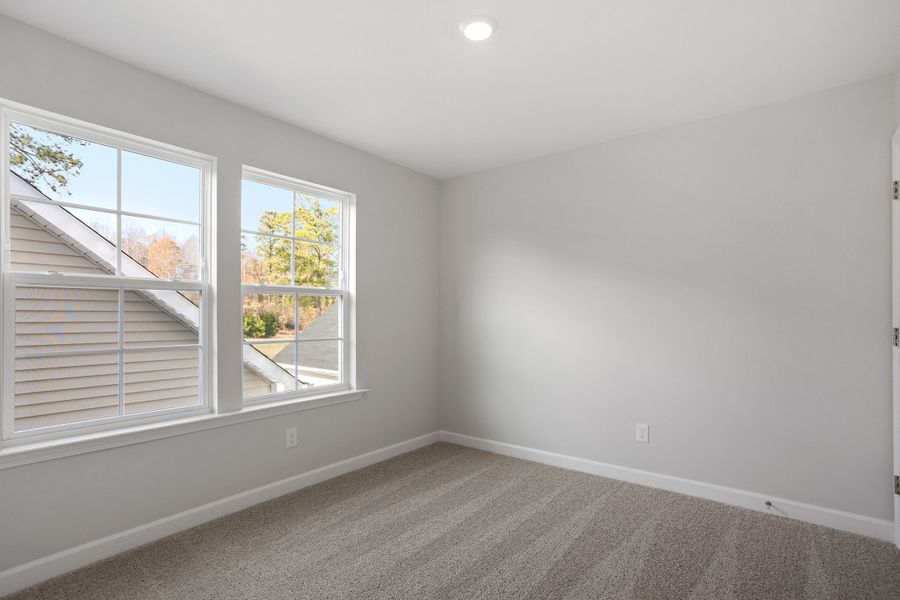 Spacious, unfurnished interior of a new home in Renaissance at White Oak, Garner (Image 24).