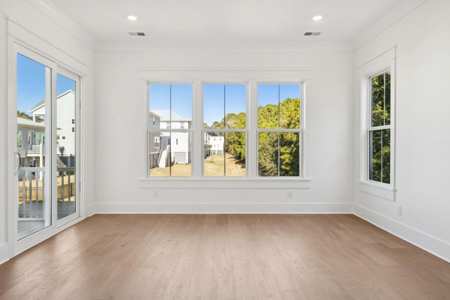 Spacious, unfurnished interior of a new home in Overlook at Copahee Sound, Awendaw (Image 69).