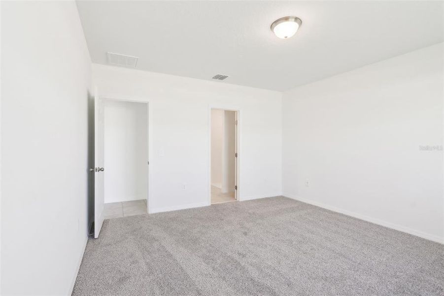 Spacious, unfurnished interior of a new home in Lawson Dunes - Signature Series, Haines City (Image 29). Spacious, unfurnished interior of a new home in Lawson Dunes - Signature Series, Haines City (Image 29).