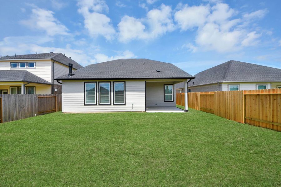 Backyard retreat, offering an abundance of space for kids to play and explore. The possibilities are endless in this outdoor haven, where the joy of open-air activities and family gatherings awaits.