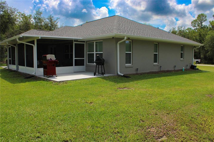 Exterior details and patio area of a home in , Summerfield (Image 22).