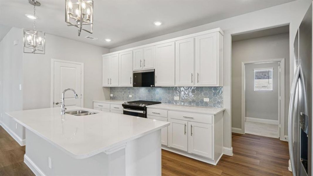 Photo is not of the actual home, but is an inspirational photo of builder’s model home and may depict options, furnishings, and/or decorator features that are not included.