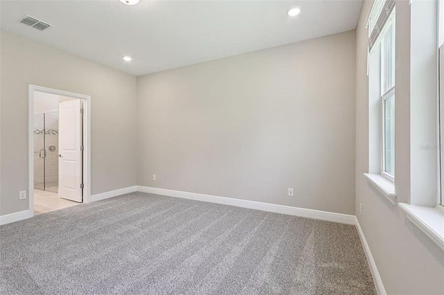 Spacious, unfurnished interior of a new home in Legends Preserve - Signature Series, Daytona Beach (Image 43).