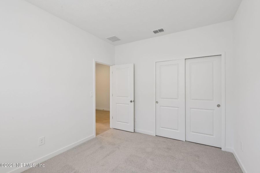 Spacious, unfurnished interior of a new home in Flagler Village - Signature Series, Palm Coast (Image 14).