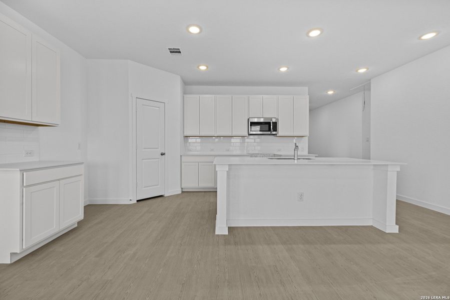 Furnished interior view inside a new home in Voss Farms, New Braunfels (Image 8).