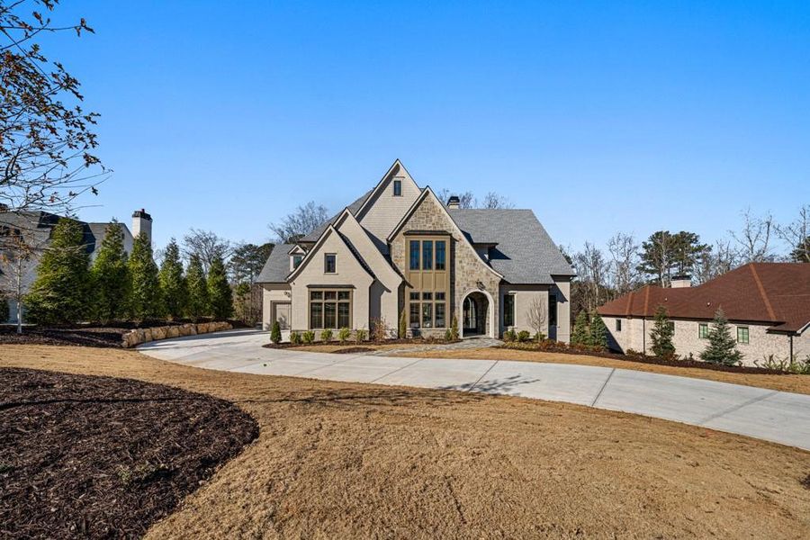 Front exterior of a new home in , Milton, GA, highlighting curb appeal (Image 37).