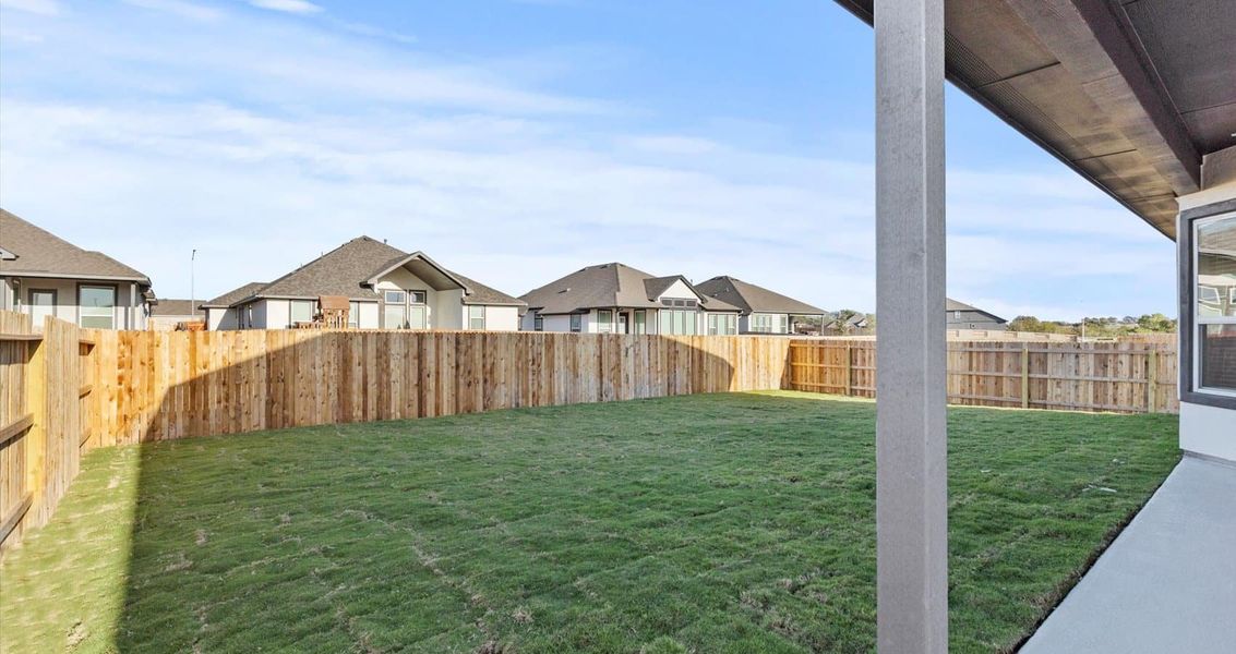 Exterior details and patio area of a home in Village at Three Oaks, Seguin (Image 3). Exterior details and patio area of a home in Village at Three Oaks, Seguin (Image 3).