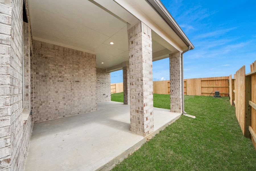 Experience outdoor living at its finest on this expansive covered patio, thoughtfully designed for BBQs and delightful outdoor dining. Experience outdoor living at its finest on this expansive covered patio, thoughtfully designed for BBQs and delightful outdoor dining.