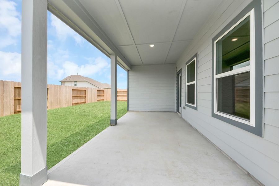 Exterior details and patio area of a home in Sundance Cove, Crosby (Image 4).