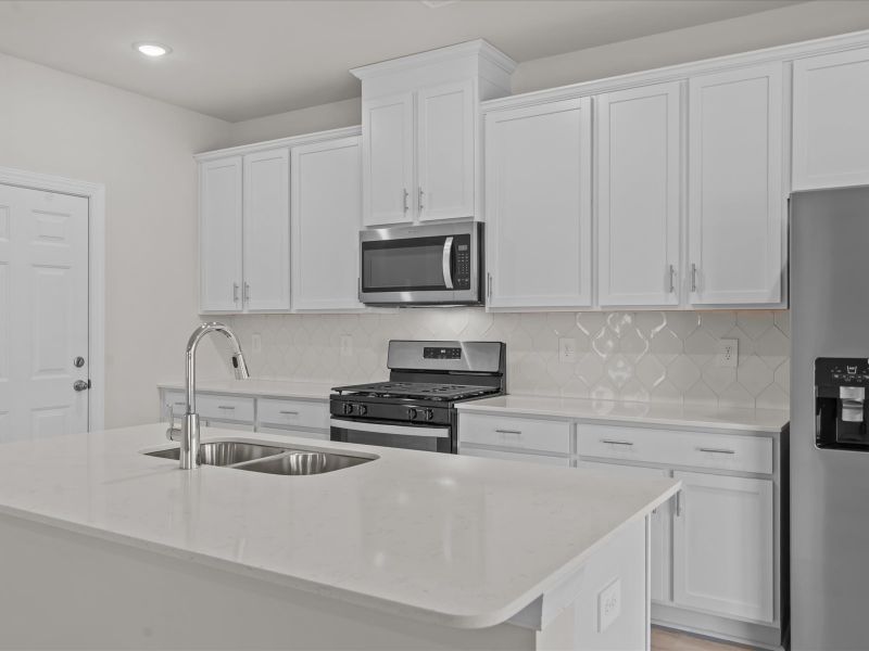 Furnished interior view inside a new home in The Farm at Wells Creek - Heritage Collection, Gray Court (Image 4).