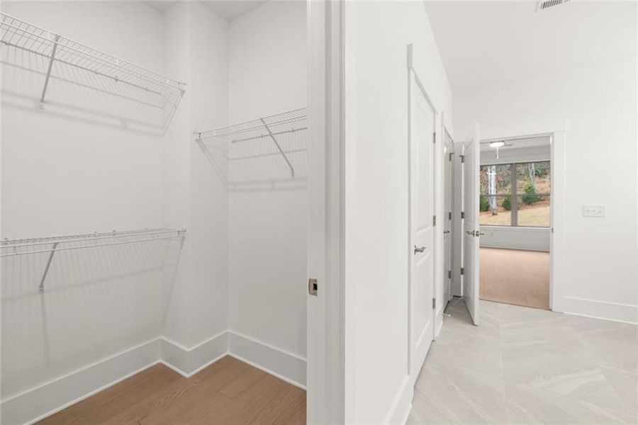 Spacious, unfurnished interior of a new home in Soleil Belmont Park, Canton (Image 50).