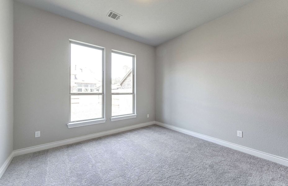 Spacious, unfurnished interior of a new home in Artavia 70′, Conroe (Image 38).