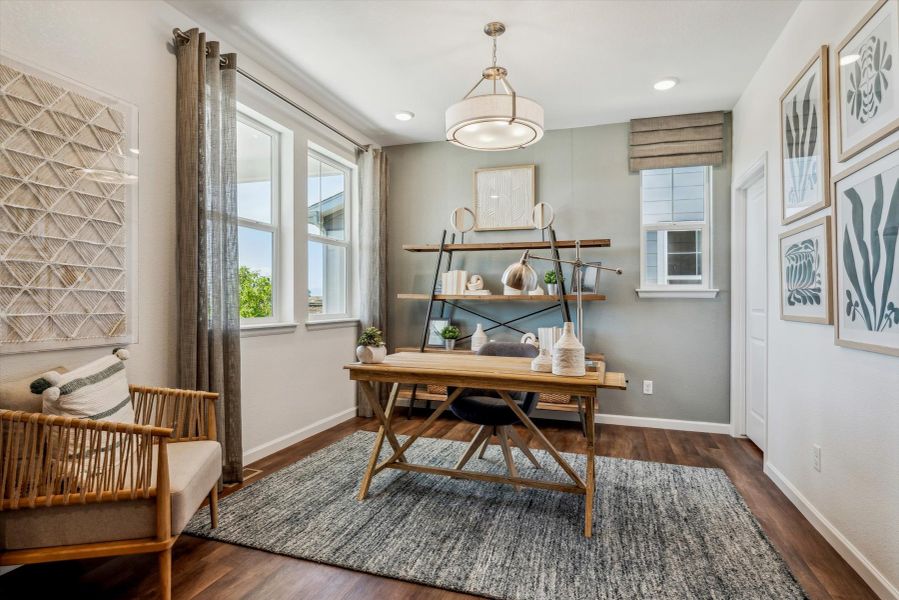 A room with a table and chairs. A room with a table and chairs.