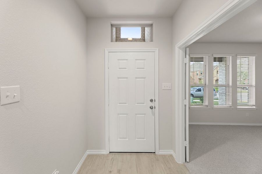 Front exterior of a new home in DeBerry Reserve, Royse City, TX, highlighting curb appeal (Image 19). Front exterior of a new home in DeBerry Reserve, Royse City, TX, highlighting curb appeal (Image 19).