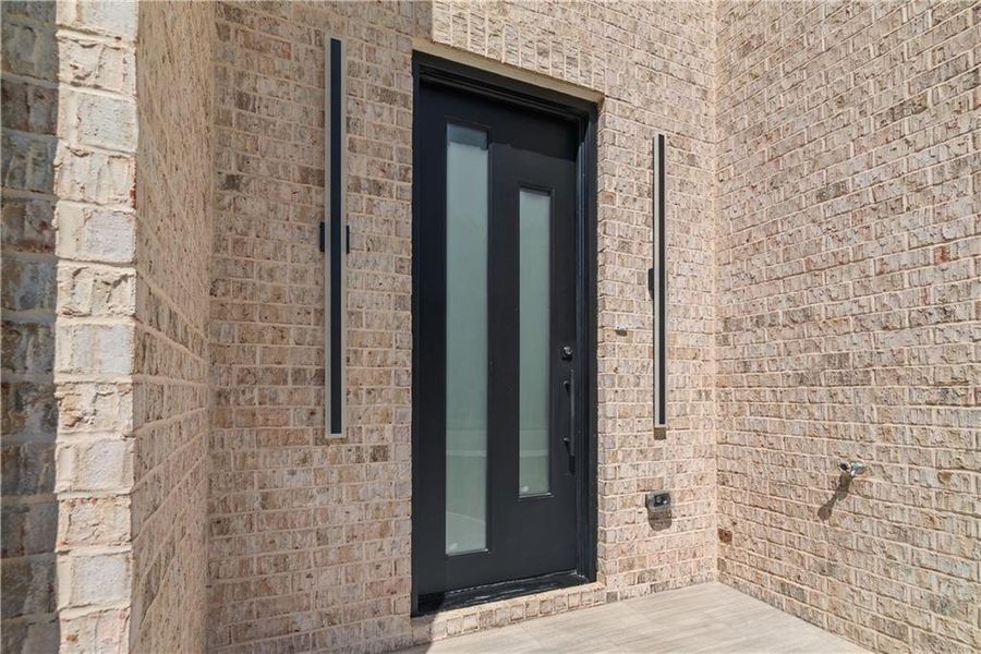 Exterior details and patio area of a home in , Stockbridge (Image 3).