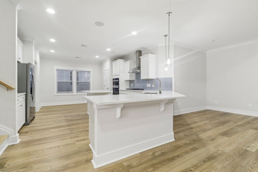 Representative furnished interior of a home built from the Ariel II by Great Southern Homes in Collins Cove, Chapin (Image 6).