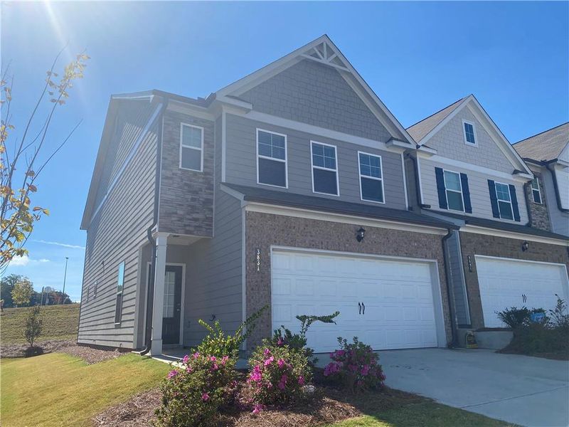 Front exterior of a new home in , Gainesville, GA, highlighting curb appeal (Image 1). Front exterior of a new home in , Gainesville, GA, highlighting curb appeal (Image 1).