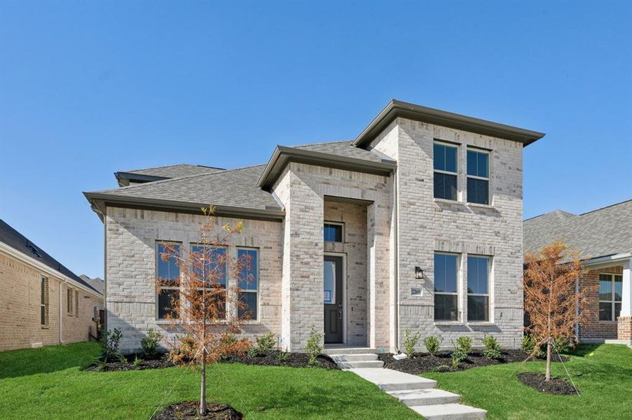 View of front of house featuring a front yard