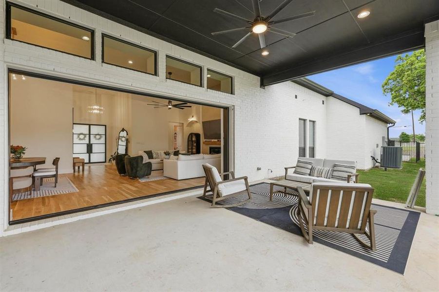 View of patio / terrace with outdoor furniture and ceiling fan