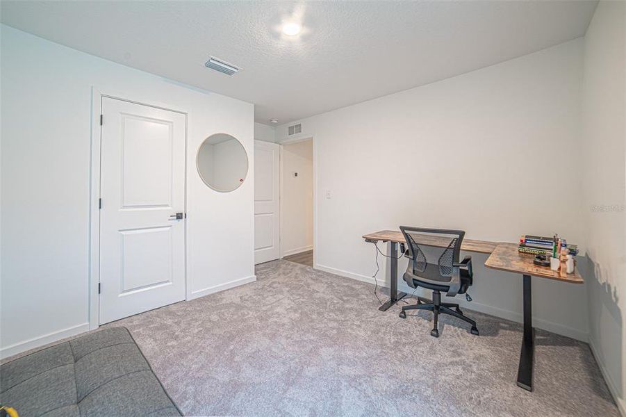 Furnished interior view inside a new home in The Crossing at Palm River, Tampa (Image 13).
