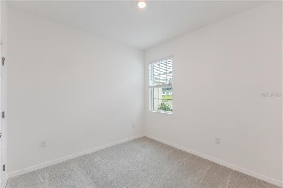 Spacious, unfurnished interior of a new home in Liberty Station, Orange City (Image 12).