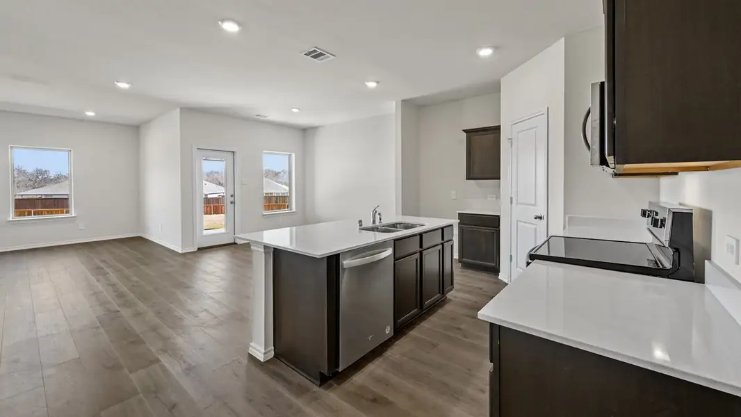Furnished interior view inside a new home in Crane Crossing, Crandall (Image 3).