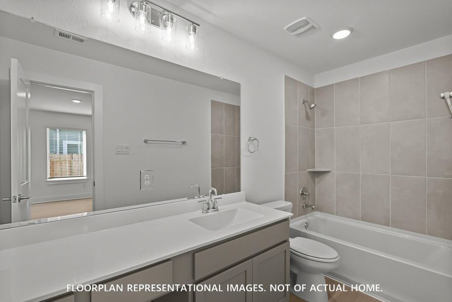 Furnished interior view inside a new home in Pinewood at Grand Texas, New Caney (Image 5).