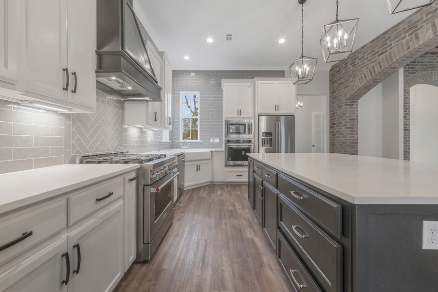 Representative furnished interior of a home built from the The Lafitte by Manuel Builders in Chapel Bend, Montgomery (Image 7).