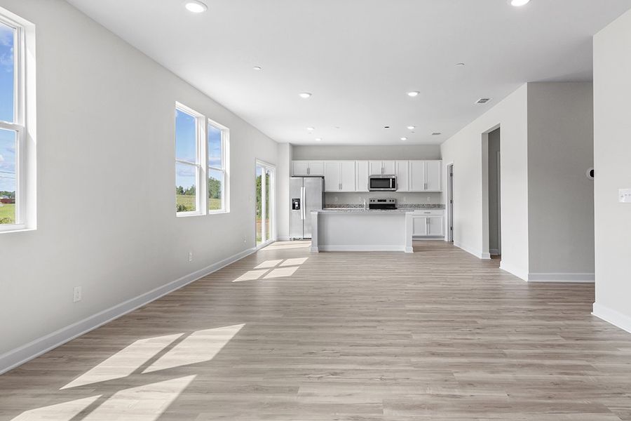 A large empty kitchen. A large empty kitchen.