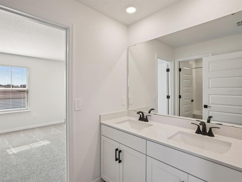 Furnished interior view inside a new home in Two Rivers - Signature Series, Zephyrhills (Image 7).