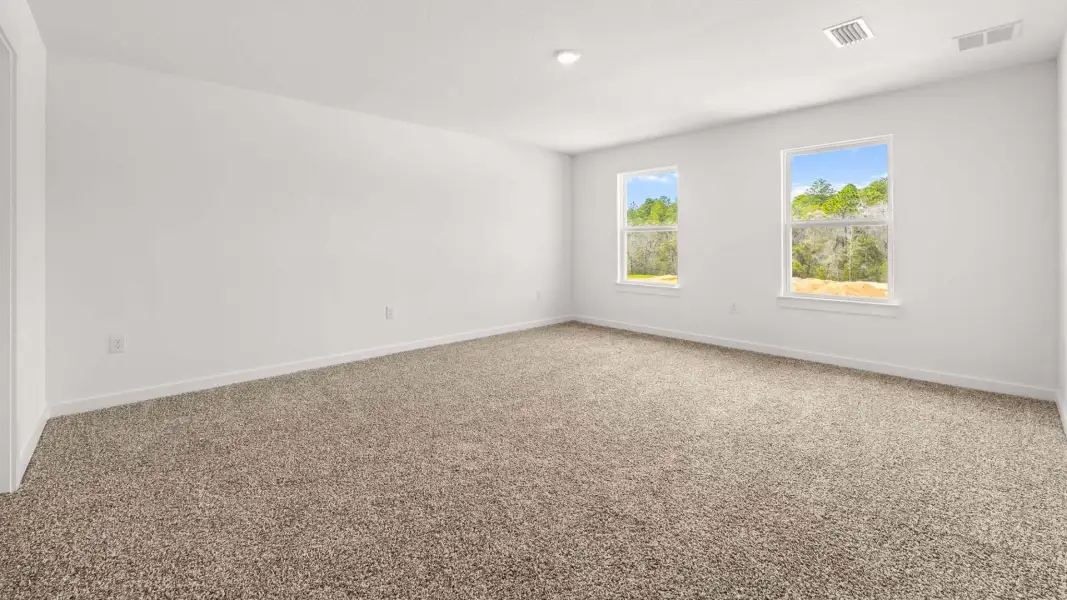 Spacious, unfurnished interior of a new home in Magnolia at the Bluffs Phase 3, Freeport (Image 17).