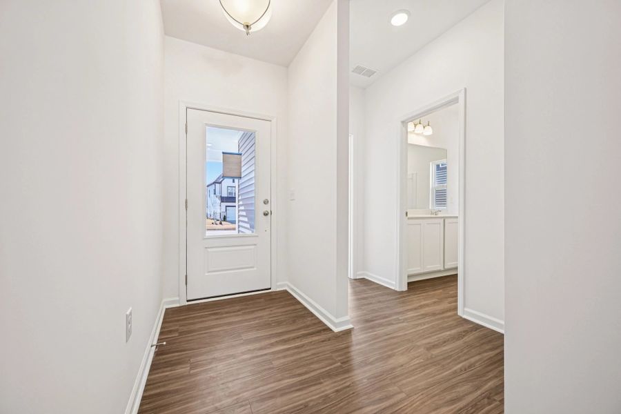 Foyer - An entry with sleek tones and flair.