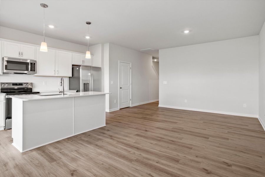 Spacious, unfurnished interior of a new home in West Main Townhomes, Sanford (Image 14).