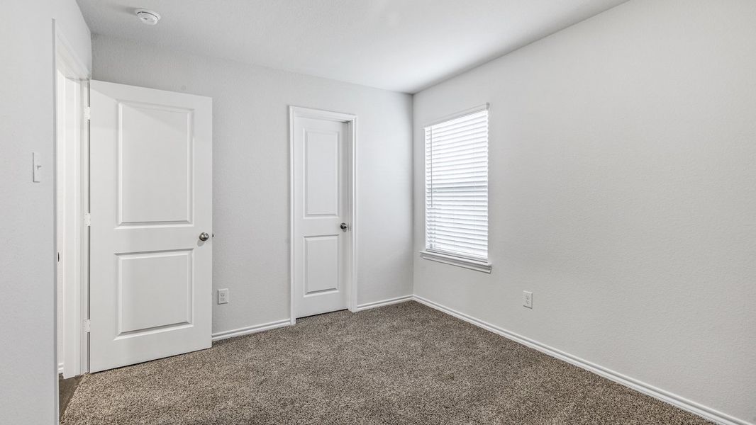 Spacious, unfurnished interior of a new home in Stonewyck Farms, Ennis (Image 19).