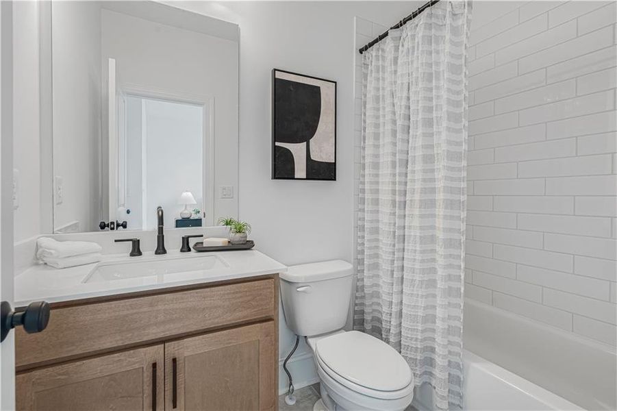 Furnished interior view inside a new home in Waterhaven, Cumming (Image 16).
