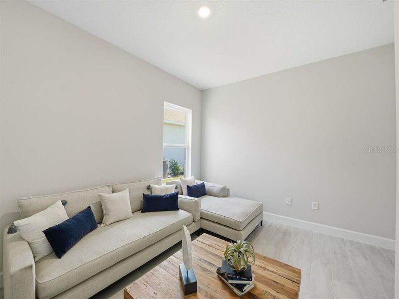 Furnished interior view inside a new home in Esplanade at Westview, Kissimmee (Image 9).