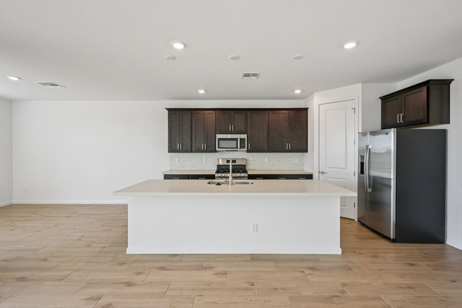Kitchen featuring the Roosevelt Collection. Finishes and options may vary by community