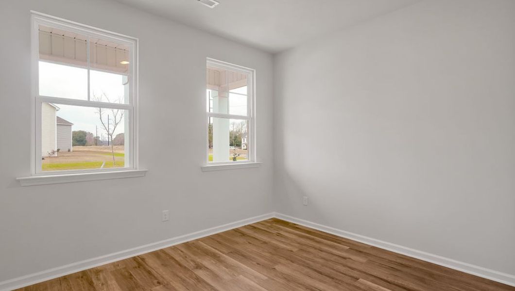 Representative unfurnished interior of a home built from the GLYNN by D.R. Horton in Grayson Park, Leland (Image 15).