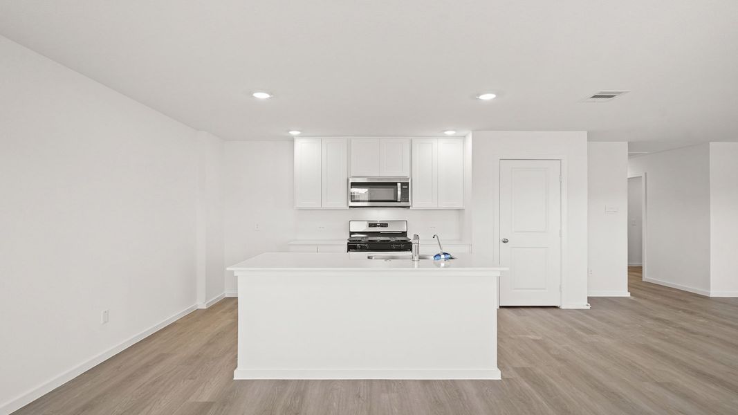 Furnished interior view inside a new home in Westward Pointe, Sealy (Image 6).