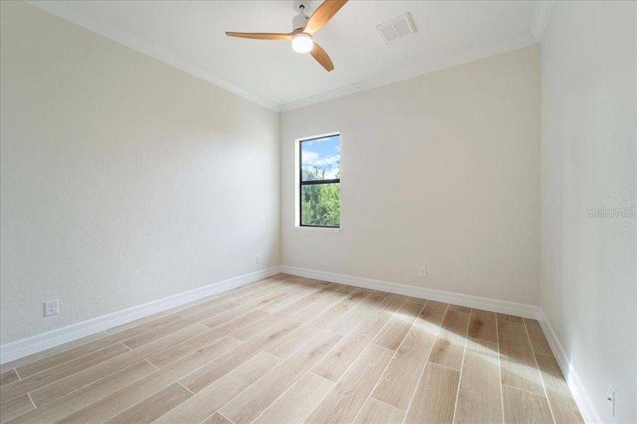 Spacious, unfurnished interior of a new home in , Port Charlotte (Image 23).